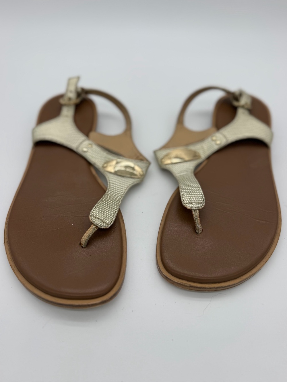 Michael Kors Metallic Gold T-Strap Sandals with Brown Footbed